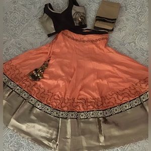 Beautiful coral, black and gold lehenga